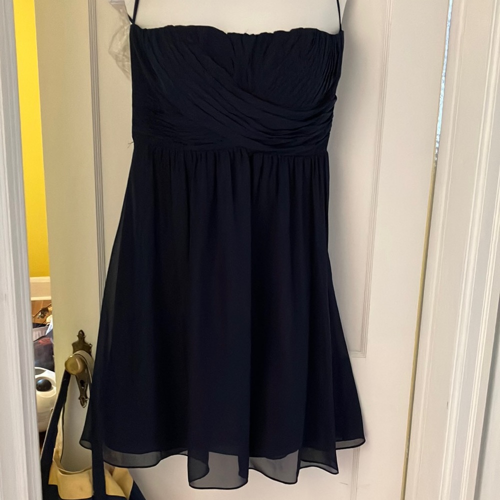 Navy strapless pleated bodice dress